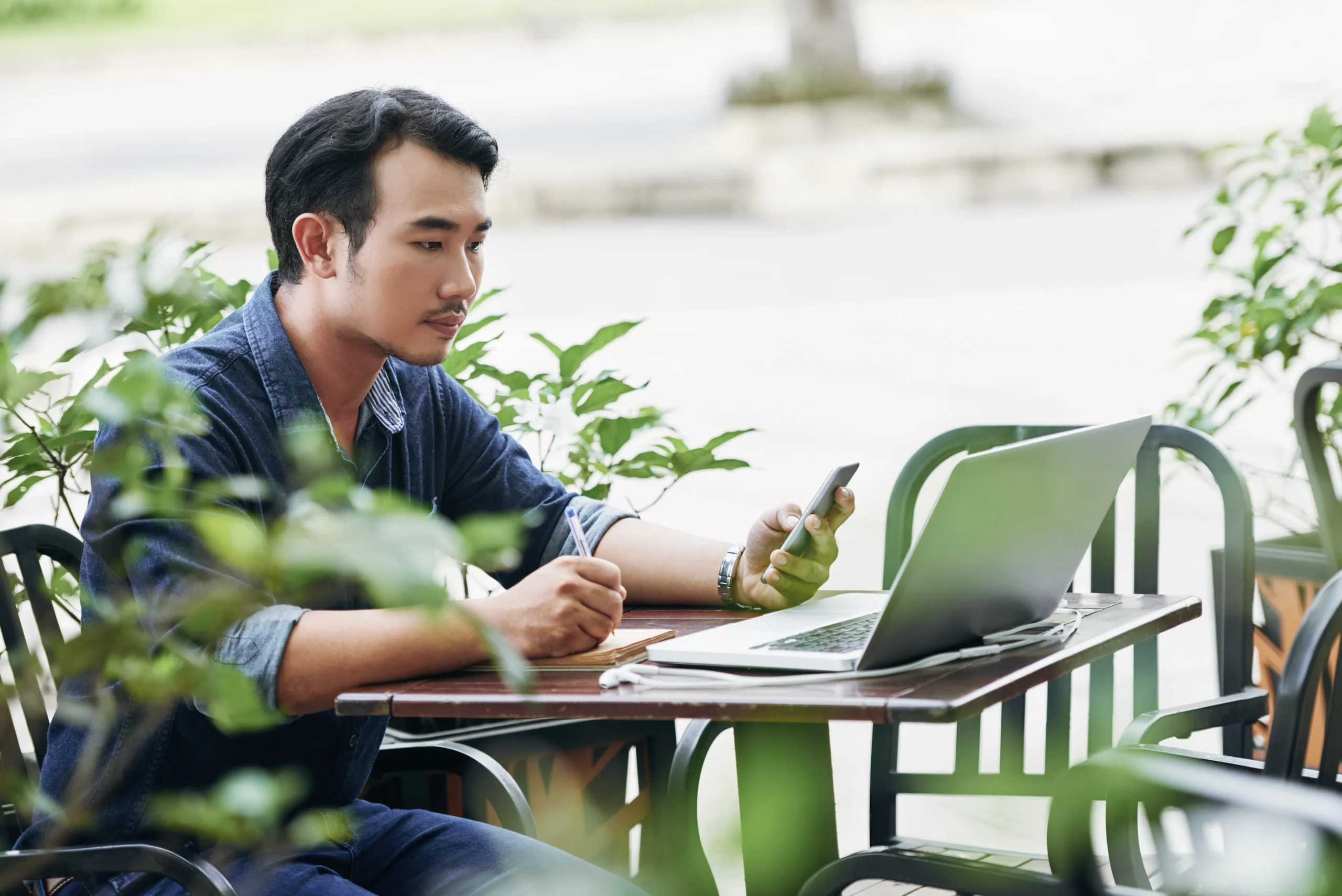 Employee working at desk with laptop